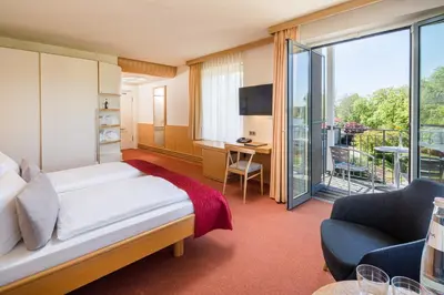 Ein Bett oder Betten in einem Zimmer der Unterkunft Seehotel Rheinsberg