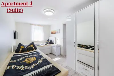 Ein Bett oder Betten in einem Zimmer der Unterkunft FeWo an der Havel
