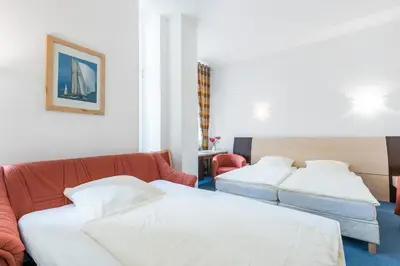Ein Bett oder Betten in einem Zimmer der Unterkunft Pension Prenzlberg