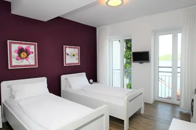 Ein Bett oder Betten in einem Zimmer der Unterkunft Ferienwohnung am Pfaffe-Kai