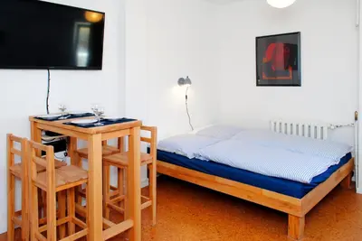 Ein Bett oder Betten in einem Zimmer der Unterkunft Appartement über dem Kino Toni
