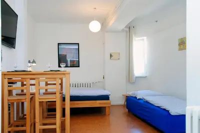 Ein Bett oder Betten in einem Zimmer der Unterkunft Appartement über dem Kino Toni
