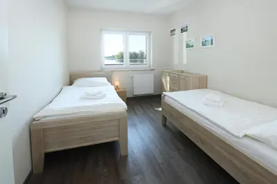Ein Bett oder Betten in einem Zimmer der Unterkunft Ferienanlage Pritzerbe