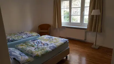 Ein Bett oder Betten in einem Zimmer der Unterkunft Beautiful House in Zehlendorf