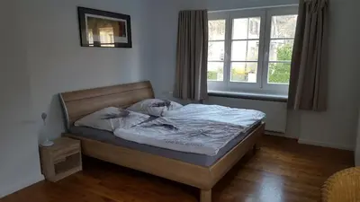 Ein Bett oder Betten in einem Zimmer der Unterkunft Beautiful House in Zehlendorf