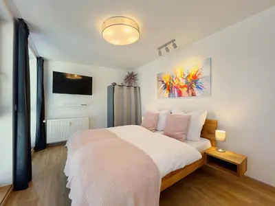 Ein Bett oder Betten in einem Zimmer der Unterkunft FeWo Jung