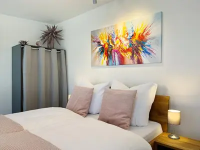 Ein Bett oder Betten in einem Zimmer der Unterkunft FeWo Jung