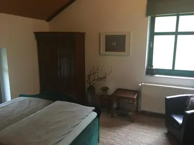 Ein Bett oder Betten in einem Zimmer der Unterkunft Altes Forsthaus Garzau