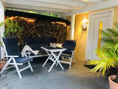 Ein Patio oder anderer Außenbereich in der Unterkunft Apartment TinyHouse mit Pool, Outdoor Whirlpool und Garten