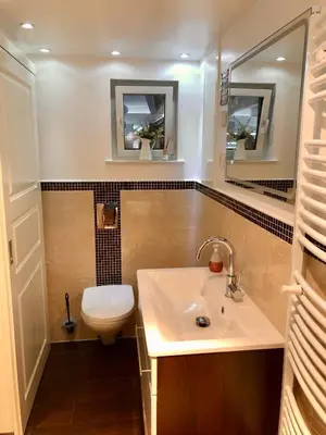 Ein Badezimmer in der Unterkunft Apartment TinyHouse mit Pool, Outdoor Whirlpool und Garten