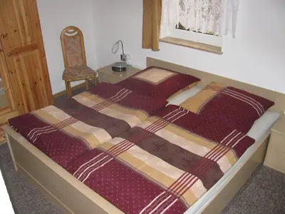 Ein Bett oder Betten in einem Zimmer der Unterkunft Ferienwohnung Anjadina