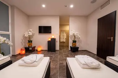 Ein Bett oder Betten in einem Zimmer der Unterkunft PLAZA Premium Berlin Kurfürstendamm