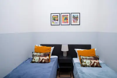 Ein Bett oder Betten in einem Zimmer der Unterkunft BIG CENTRAL CITY APARTMENT