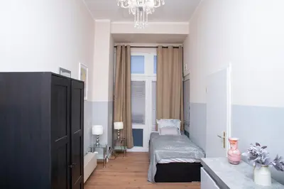 Ein Bett oder Betten in einem Zimmer der Unterkunft BIG CENTRAL CITY APARTMENT