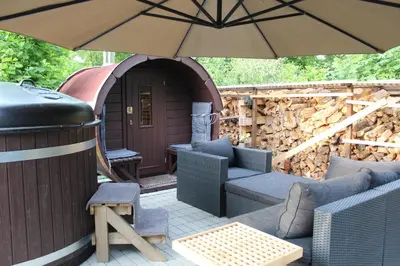 Ein Sitzbereich in der Unterkunft Sommerhausrelaxing für gestreßte Menschen