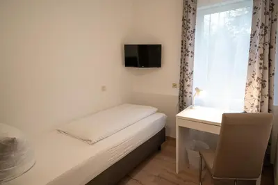 Ein Bett oder Betten in einem Zimmer der Unterkunft Gutshof Havelland