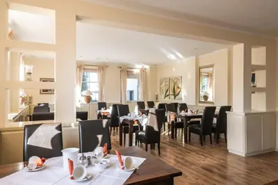 Ein Restaurant oder anderes Speiselokal in der Unterkunft Gutshof Havelland