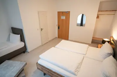 Ein Bett oder Betten in einem Zimmer der Unterkunft Gutshof Havelland