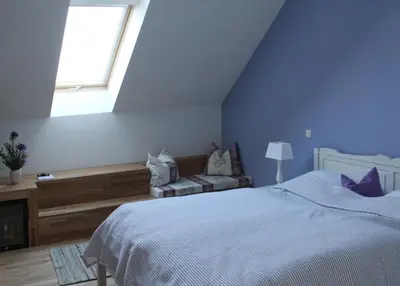 Ein Bett oder Betten in einem Zimmer der Unterkunft Landhaus Ribbeck
