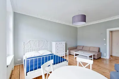 Ein Bett oder Betten in einem Zimmer der Unterkunft Magnificent turn of century flat (legal)