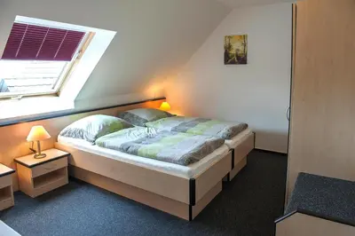Ein Bett oder Betten in einem Zimmer der Unterkunft Appartements Am Spreewaldfliess, Schlepzig