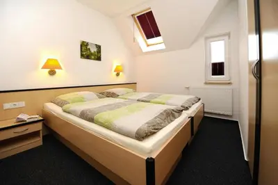 Ein Bett oder Betten in einem Zimmer der Unterkunft Appartements Am Spreewaldfliess, Schlepzig