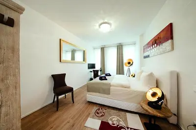 Ein Bett oder Betten in einem Zimmer der Unterkunft Doppelhaushälften, Strausberg