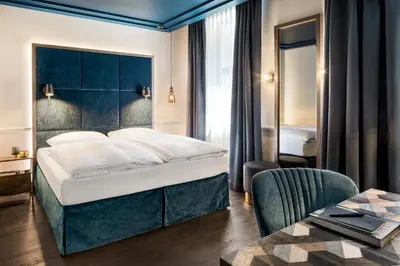 Ein Bett oder Betten in einem Zimmer der Unterkunft Hotel AMO by AMANO Friedrichstraße