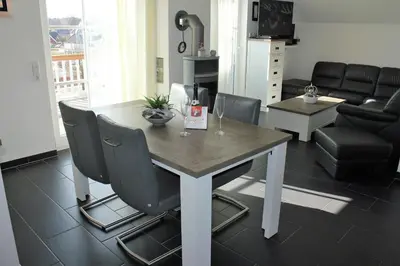 Ein Sitzbereich in der Unterkunft 5*Ferienwohnung Seeblick 4