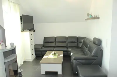 Ein Sitzbereich in der Unterkunft 5*Ferienwohnung Seeblick 4