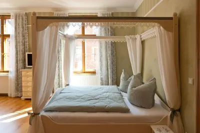 Ein Bett oder Betten in einem Zimmer der Unterkunft Apartmenthaus im holländischen Viertel