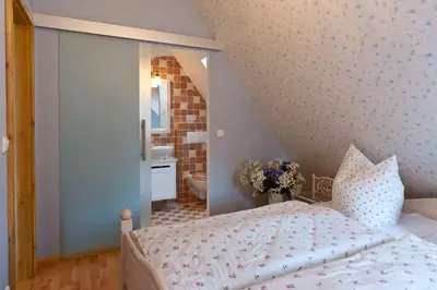 Ein Bett oder Betten in einem Zimmer der Unterkunft Apartmenthaus im holländischen Viertel