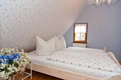 Ein Bett oder Betten in einem Zimmer der Unterkunft Apartmenthaus im holländischen Viertel