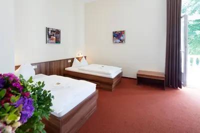 Ein Bett oder Betten in einem Zimmer der Unterkunft Europäische Akademie Berlin