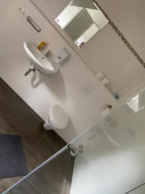Ein Badezimmer in der Unterkunft Apartment 4 - Gourmetzimmer