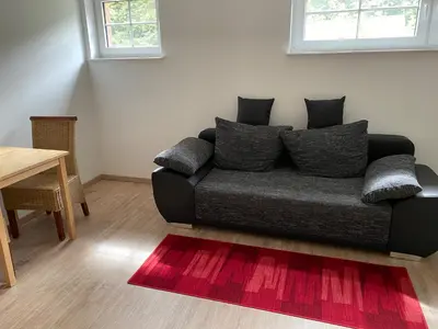 Ein Sitzbereich in der Unterkunft Apartment 4 - Gourmetzimmer
