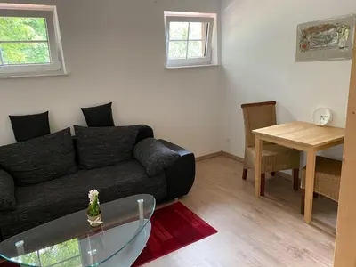Ein Sitzbereich in der Unterkunft Apartment 5 - Gourmetzimmer