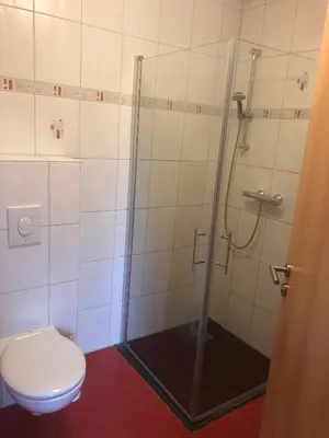 Ein Badezimmer in der Unterkunft Ferienwohnung 1 - Gourmetzimmer