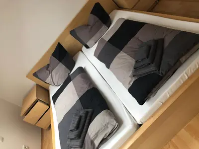 Ein Bett oder Betten in einem Zimmer der Unterkunft Ferienwohnung 1 - Gourmetzimmer
