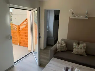 Ein Sitzbereich in der Unterkunft Ferienwohnung Blume