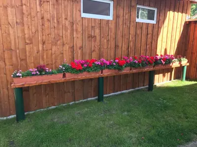 Ein Garten an der Unterkunft Ferienwohnung Blume