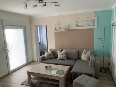 Ein Sitzbereich in der Unterkunft Ferienwohnung Blume