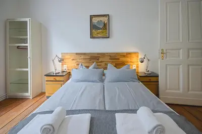 Ein Bett oder Betten in einem Zimmer der Unterkunft Courtyard Apartment (LIDELI)