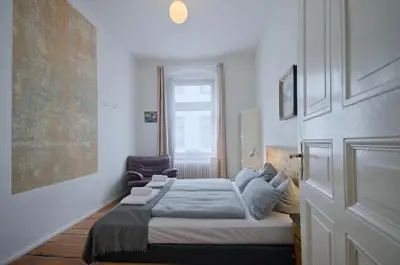 Ein Bett oder Betten in einem Zimmer der Unterkunft Courtyard Apartment (LIDELI)
