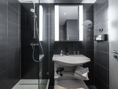 Ein Badezimmer in der Unterkunft Aparthotel Adagio Berlin Kurfürstendamm
