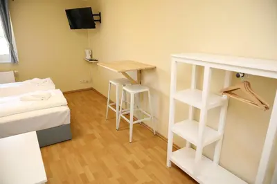 Ein Bett oder Betten in einem Zimmer der Unterkunft Pension Elfmeter