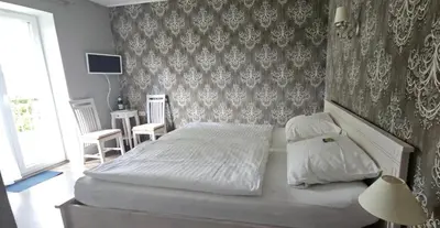 Ein Bett oder Betten in einem Zimmer der Unterkunft Cellino Hotel Prieros