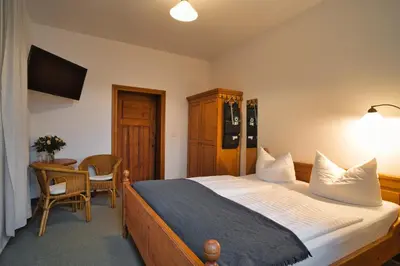 Ein Bett oder Betten in einem Zimmer der Unterkunft Luisenhof