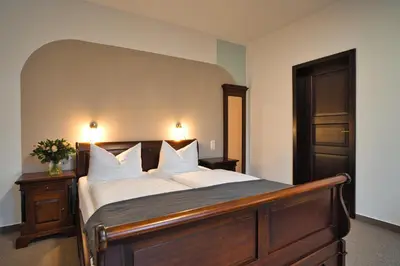 Ein Bett oder Betten in einem Zimmer der Unterkunft Luisenhof