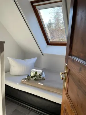 Ein Bett oder Betten in einem Zimmer der Unterkunft Luisenhof